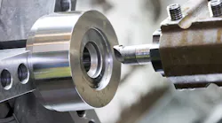Machining a mold/die part by CNC turning.