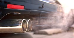 Close-up of dual exhaust pipes from a diesel car. Close-up of dual exhaust pipes from a diesel car.