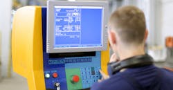 CNC machine programming and set-up. CNC machine programming and set-up.