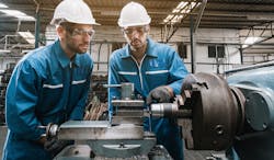 Engineering team checking machine safety. Engineering team checking machine safety.