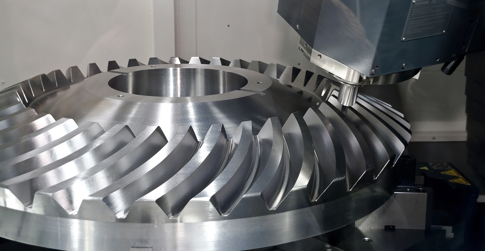 Machining a gear on a CNC machine tool.