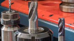 CNC milling machine with carbide end mills.