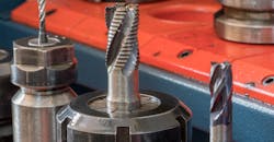 CNC milling machine with carbide end mills. CNC milling machine with carbide end mills.