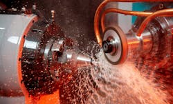 CNC lathe / turning machine drilling a metal rod with the drill tool and center drill tool. CNC lathe / turning machine drilling a metal rod with the drill tool and center drill tool.