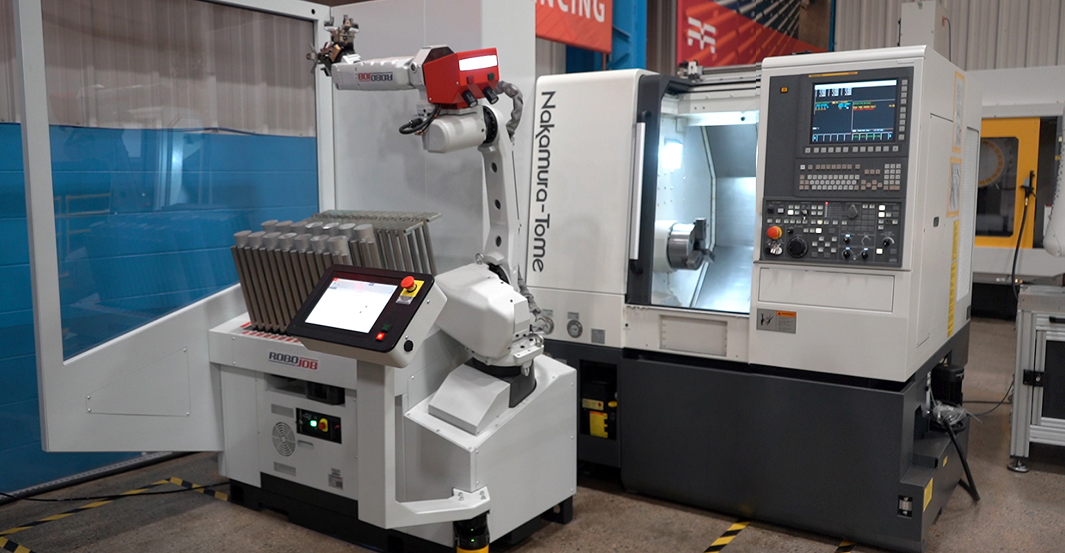 Nakamura-Tome turning center with Turn-Assist semi-collaborative automation by RoboJob.