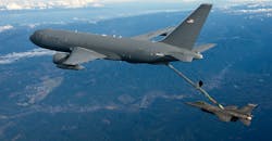 A Boeing KC-46 aircraft refuels a Boeing F-16 fighter jet. A Boeing KC-46 aircraft refuels a Boeing F-16 fighter jet.