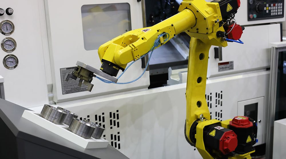 Robot tending a horizontal CNC machine.