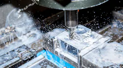 Greenleaf-360 high-performance end mill in action, with coolant.