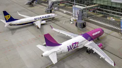 Airbus A320 and Boeing 737 aircraft at Wroclaw Airport, Poland. Aerial airplane photo taken by drone.
