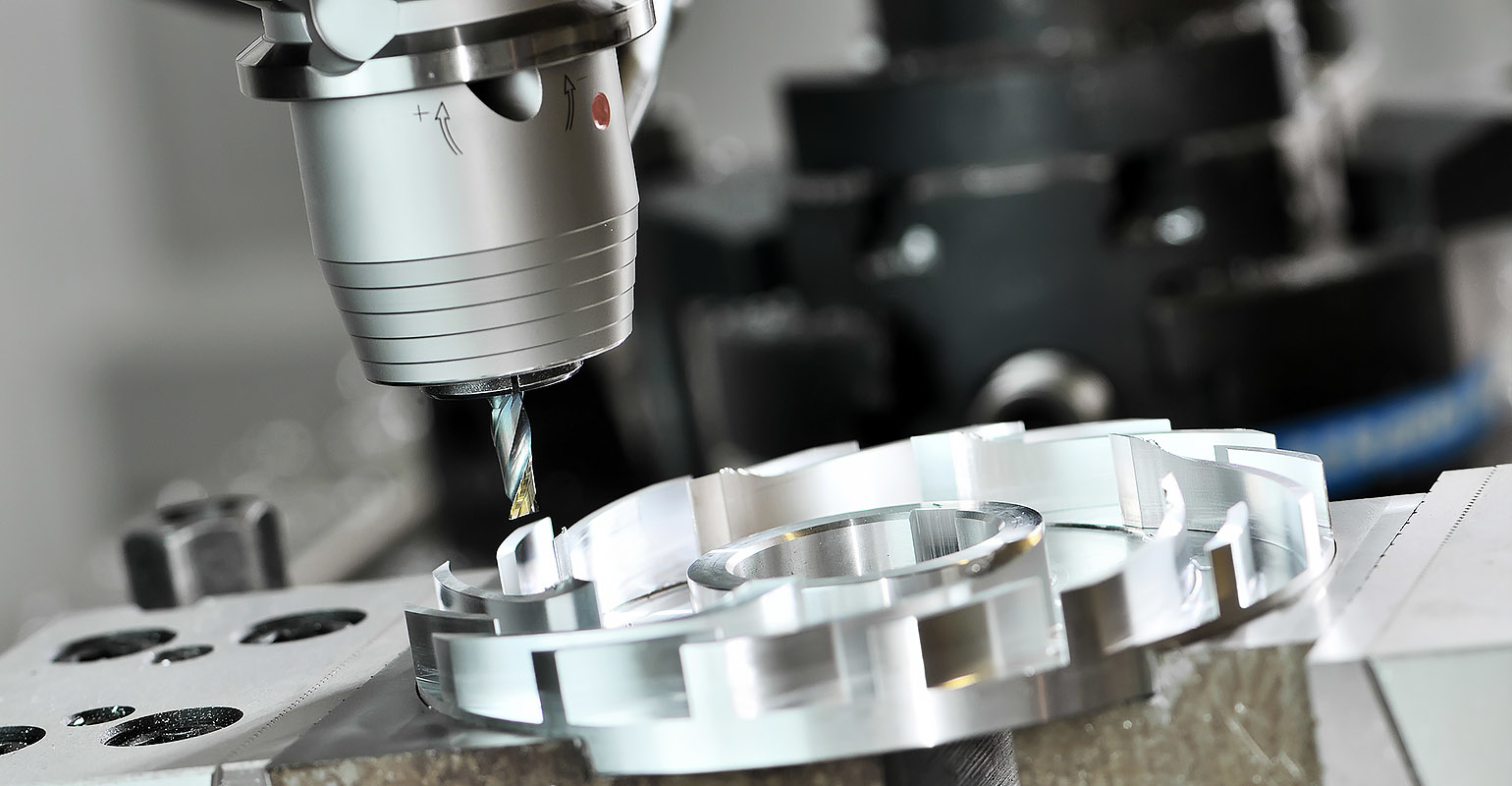 Precision industrial CNC machining of metal detail by milling.