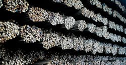 Steel warehouse with rebar stockpile. Steel warehouse with rebar stockpile.