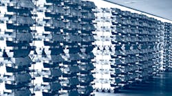 Aluminum ingots stacked in a warehouse.