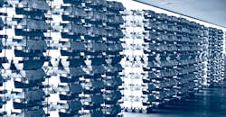 Aluminum ingots stacked in a warehouse. Aluminum ingots stacked in a warehouse.