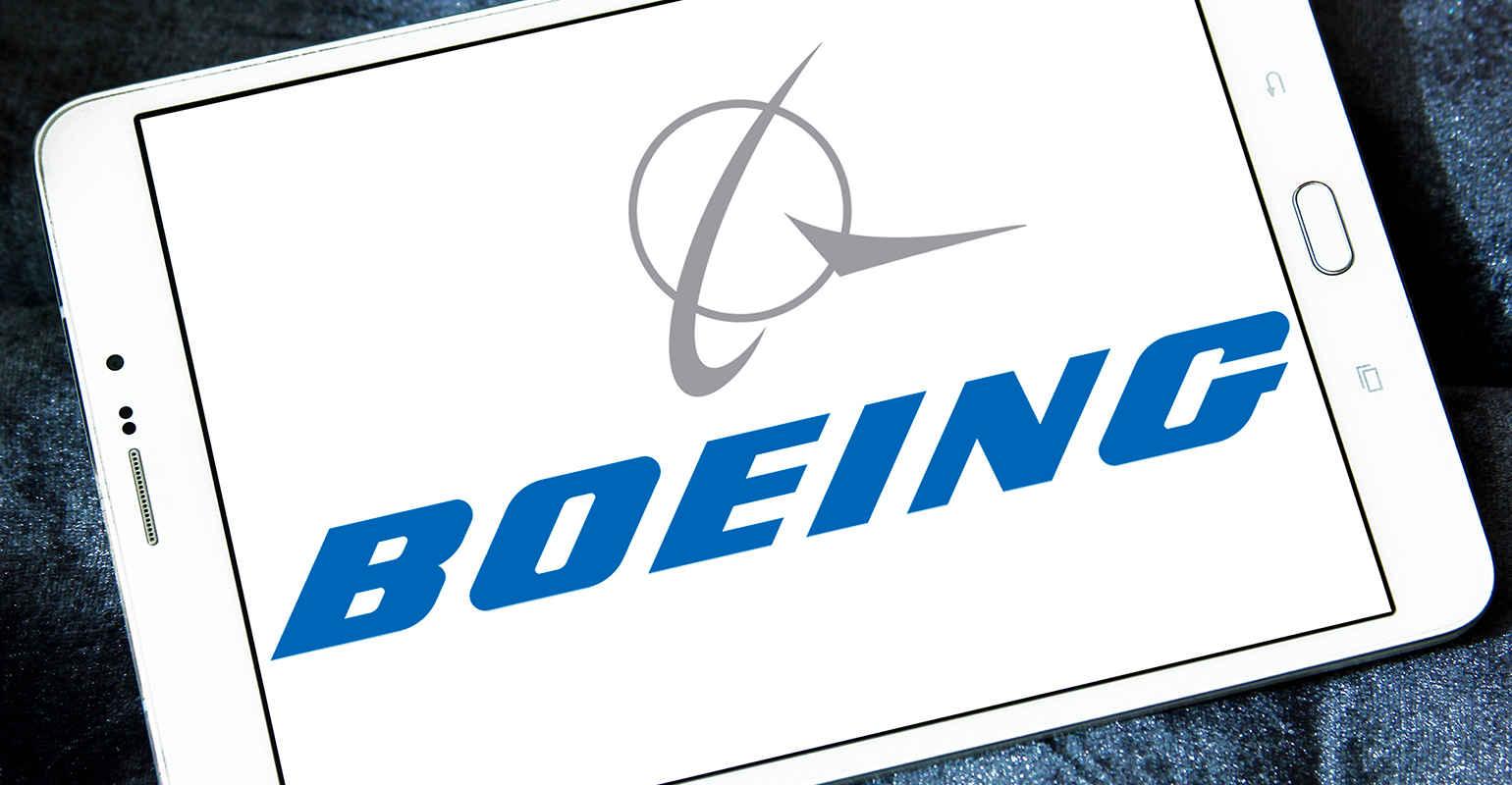 Tablet with Boeing logo.