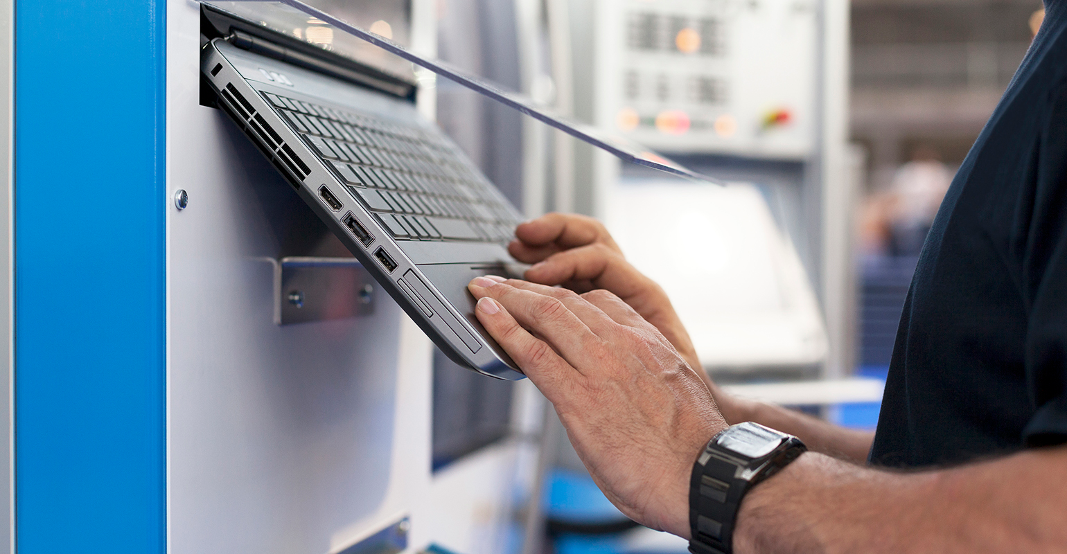 Programming a CNC machine.
