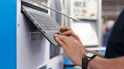 Programming a CNC machine.