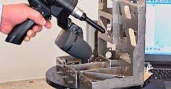 Mounted on a mobile workstation, LK Metrology's new Freedom index table being used to speed the inspection of an assembly using an LK portable measuring arm of the same name. Mounted on a mobile workstation, LK Metrology's new Freedom index table being used to speed the inspection of an assembly using an LK portable measuring arm of the same name.