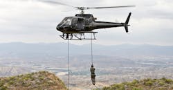 Eurocopter AS350 Ecureuil A-Star helicopter flying over Malibu, Calif., during a ‘fast rope’-type military operation. Eurocopter AS350 Ecureuil A-Star helicopter flying over Malibu, Calif., during a ‘fast rope’-type military operation.