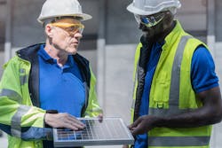 Worker, technician checking solar cell panel for sustainable manufacturing. Worker, technician checking solar cell panel for sustainable manufacturing.