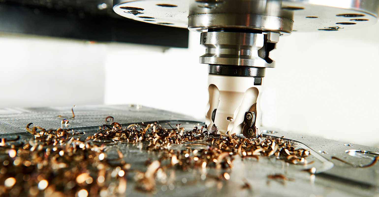 Industrial milling cutter at work.