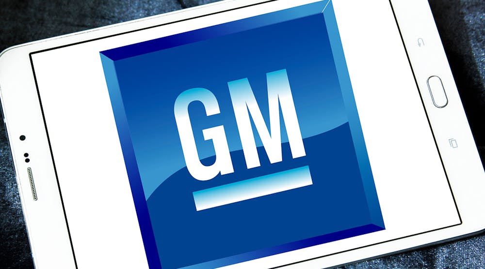 GM logo displayed on a tablet illustration.