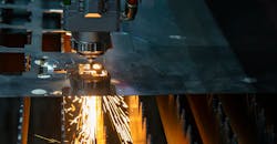 A fiber laser cutting machine controlled by a CNC program system. A fiber laser cutting machine controlled by a CNC program system.
