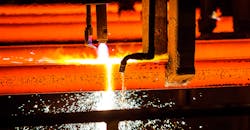 Oxy-torch cutting steel billets. Oxy-torch cutting steel billets.