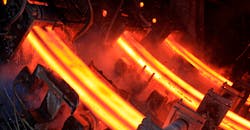 Three-strand continuous bloom caster. Three-strand continuous bloom caster.