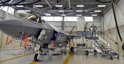 Airmen prepare an F-35A jet for maintenance at Eglin Air Force Base, Fla.