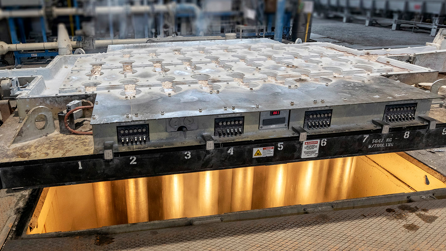 A view of primary aluminum billet casting, following aluminum production via the Hall-Heroult process.