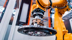 Robotic arm in an automated production cell. Robotic arm in an automated production cell.