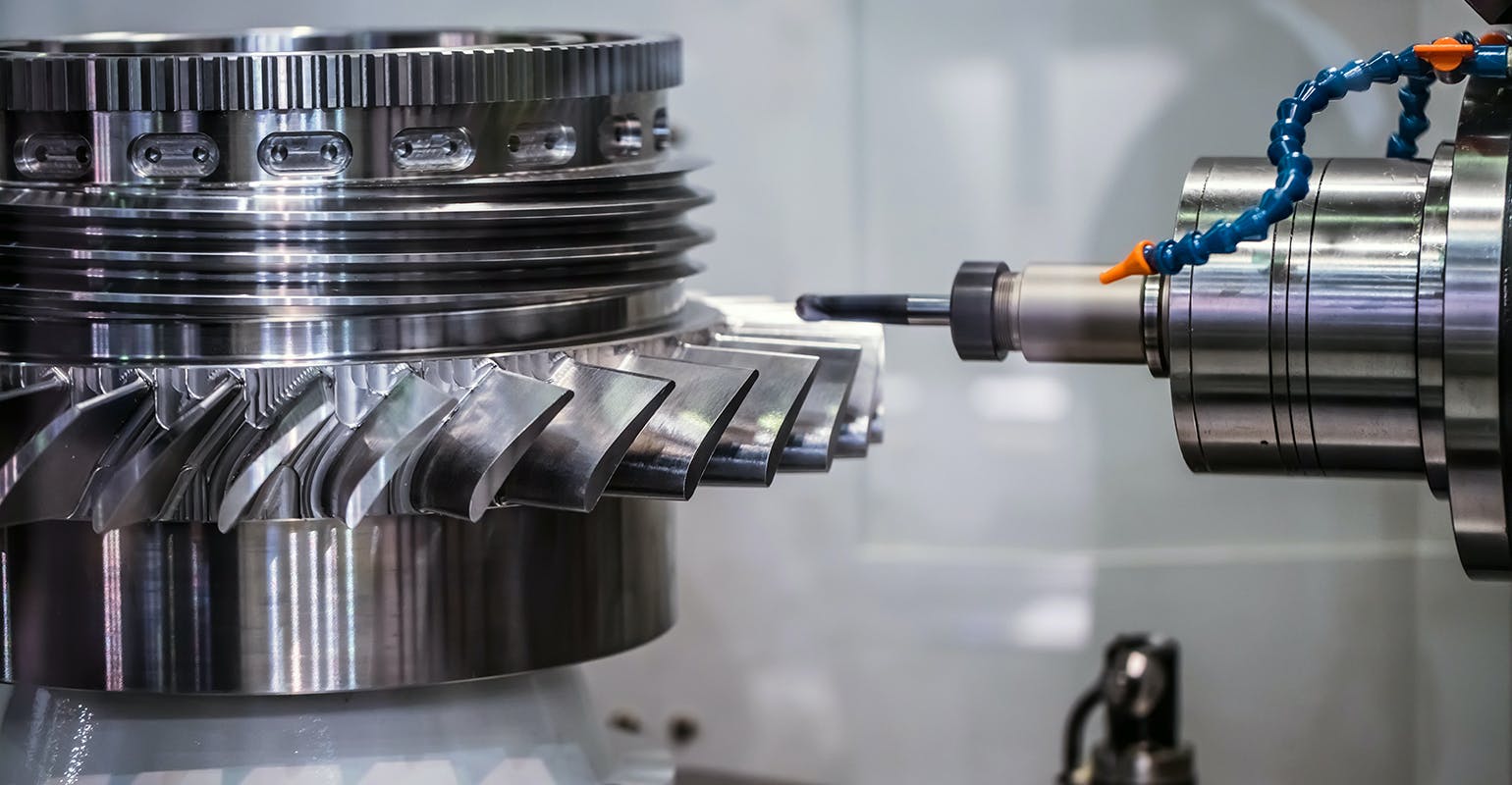 Surface finishing on a turbofan part.