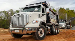 An Autocar Industries vocational truck used in road construction.