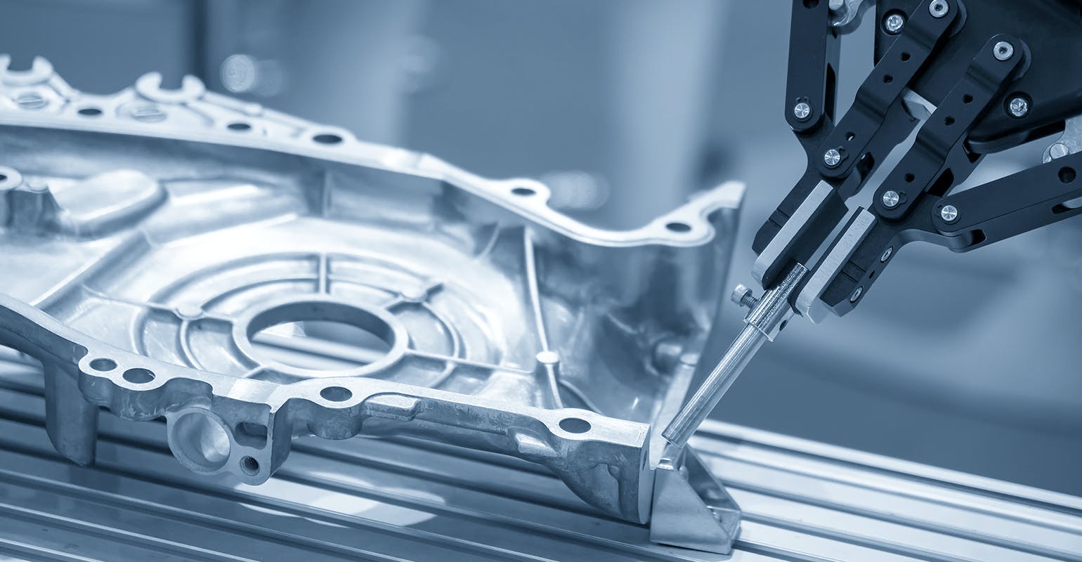 Machining an aluminum automotive part.