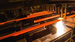 Oxy-torch cutting of steel billets at con-caster runout.