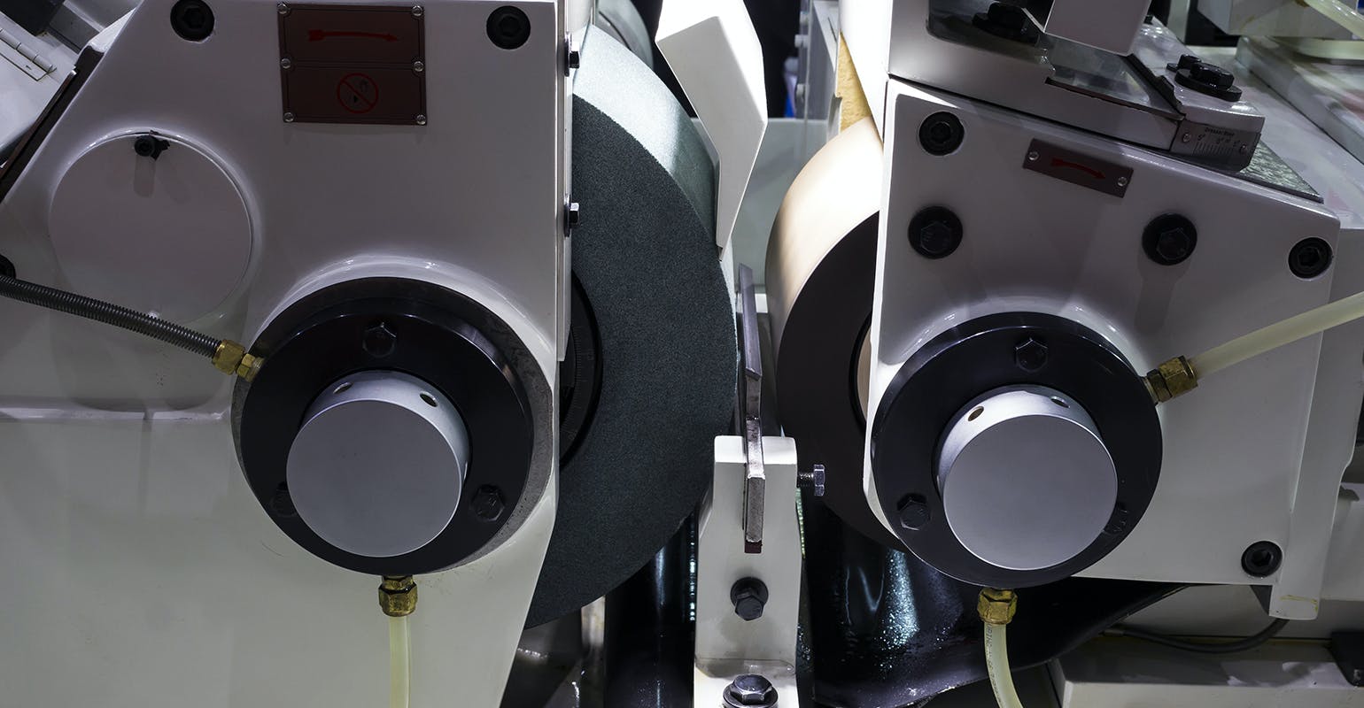 High-precision centerless grinding CNC machine.