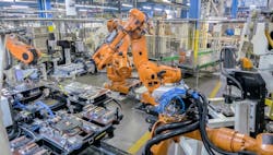 Automotive industrial robot installation. Automotive industrial robot installation.