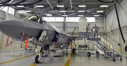 Airmen prepare an F-35A jet for maintenance at Eglin Air Force Base, Fla.