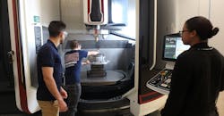 Employees at the North American Technology Accelerator, West Palm Beach, Fla., examine a part during the development of an advanced repair process. Employees at the North American Technology Accelerator, West Palm Beach, Fla., examine a part during the development of an advanced repair process.