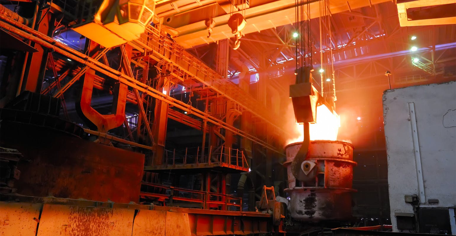 Ladle carrying molten steel.