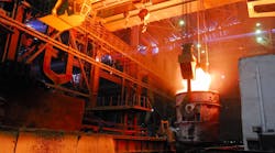 Ladle carrying molten steel.