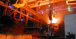 Ladle carrying molten steel. Ladle carrying molten steel.
