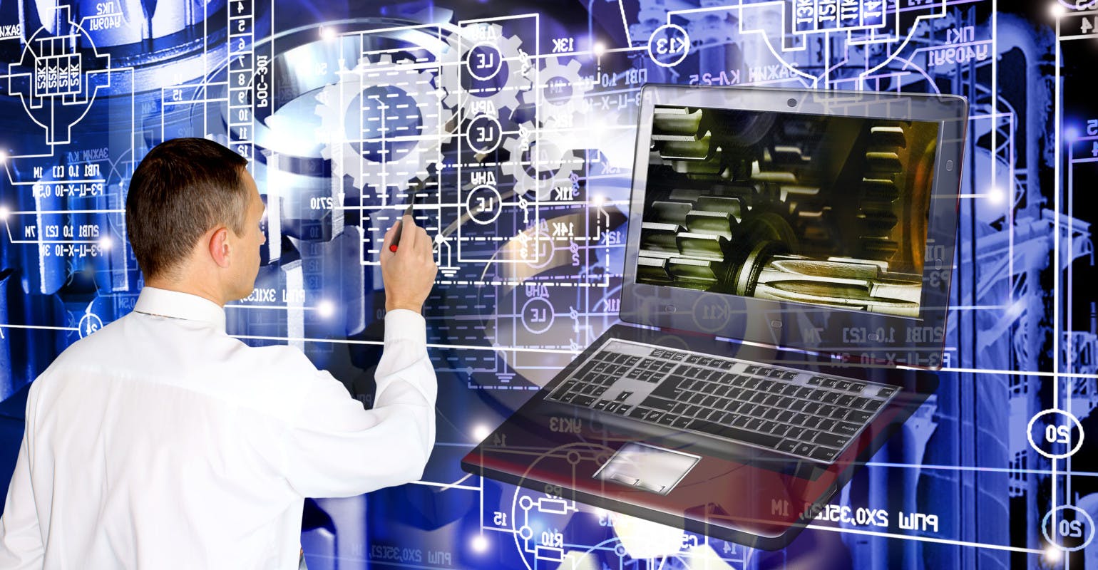 Engineer collecting data from a manufacturing computer platform.