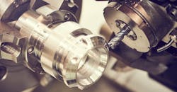 CNC machining, close-up of milling cutter with hard metal carbide insert. CNC machining, close-up of milling cutter with hard metal carbide insert.