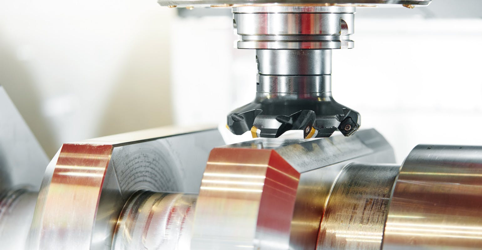 A cutting tool during detail operation in a CNC cutting job.