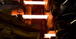 Continuous casting, in which molten metal is solidified as a semifinished billet, bloom, or slab for subsequent rolling.