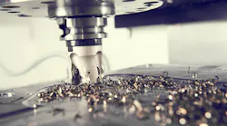 Close-up view of a milling cutter at work, CNC machining.
