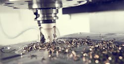 Close-up view of a milling cutter at work, CNC machining. Close-up view of a milling cutter at work, CNC machining.