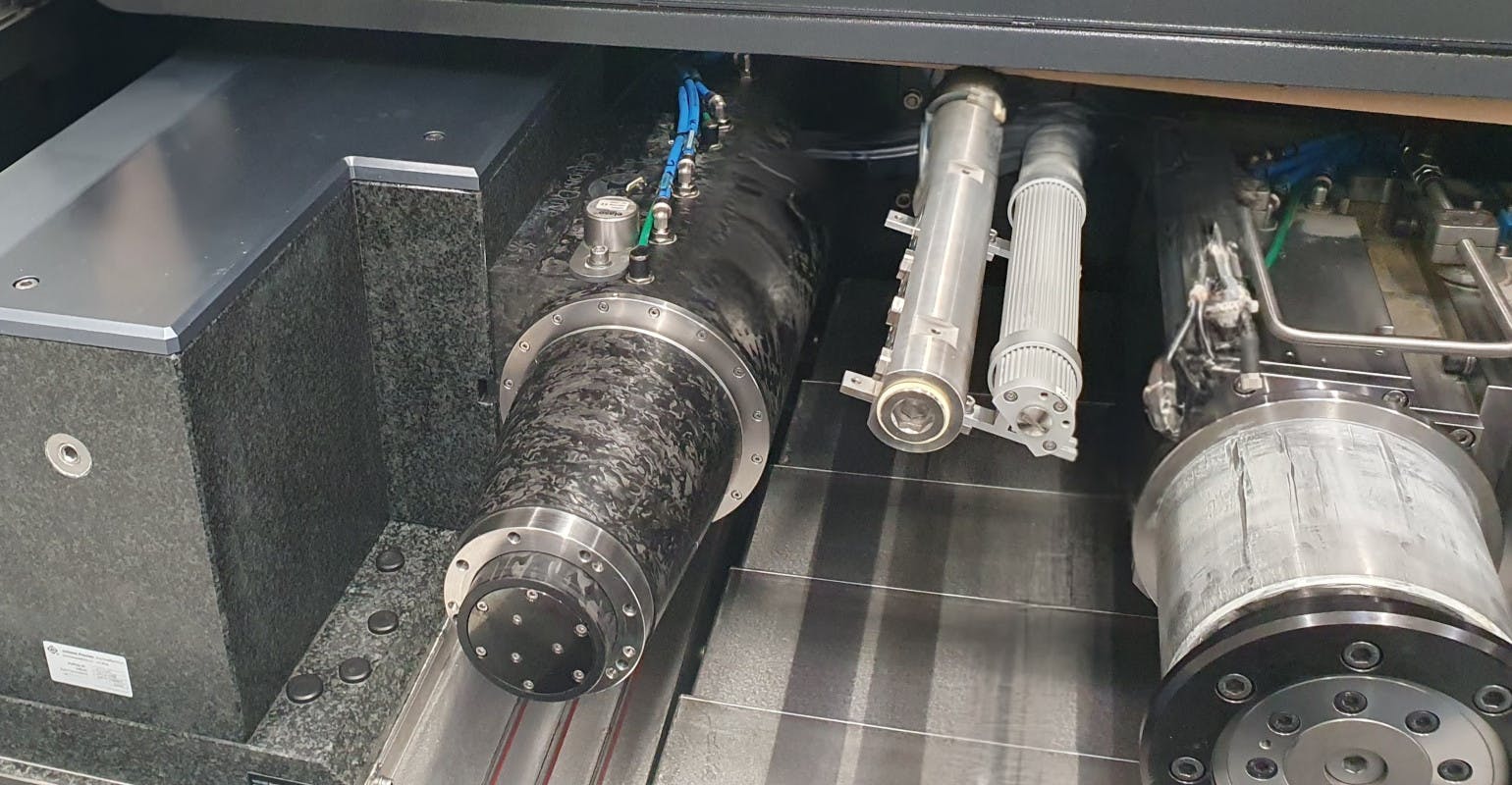 View into the working area of the Tschudin Cube 350 with a carbon-fiber spindle in place.