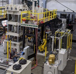 An example of an automated two-press, two-robot production cell custom designed, engineered, built and turnkey-installed by Greenerd Press & Machine. An example of an automated two-press, two-robot production cell custom designed, engineered, built and turnkey-installed by Greenerd Press & Machine.